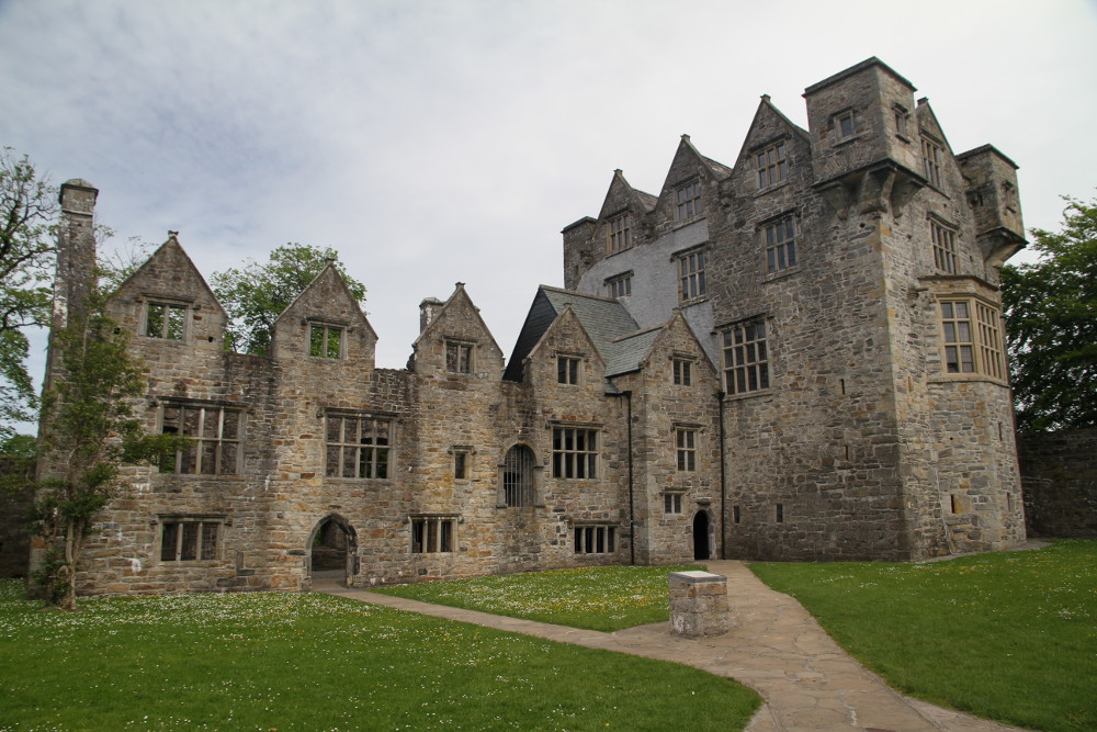 a pciture of Donegal Castle in North Ireland. full exterior, all walls intatc but no roof.